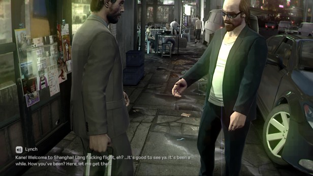 Lynch greeting Kane as he arrives in Shanghai. Lynch is lit. Kane less so.